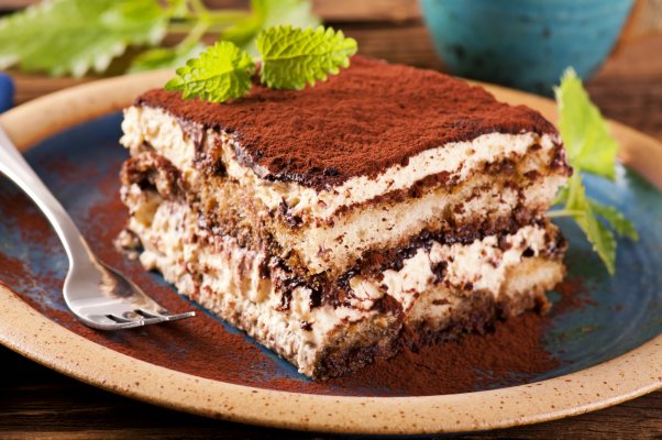 tiramisu coffee cake on a plate fork coffee makers